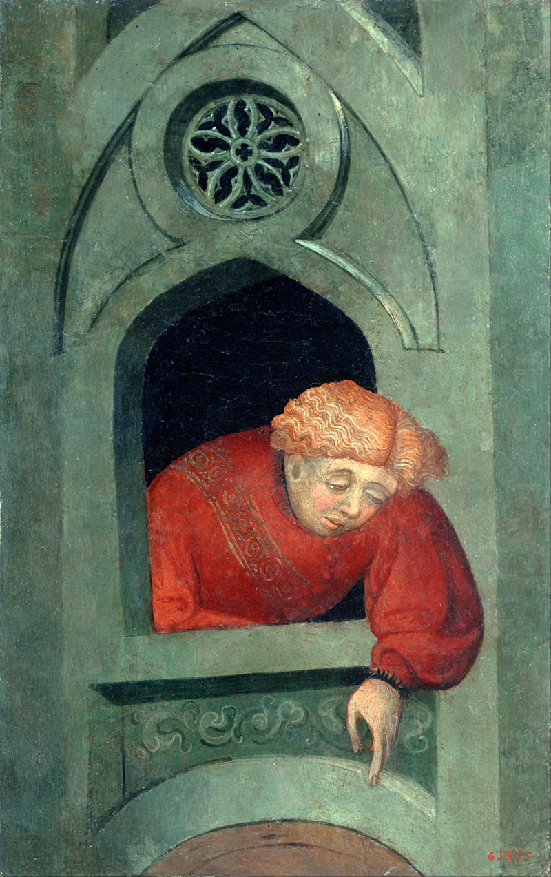 young man leaning out of the window